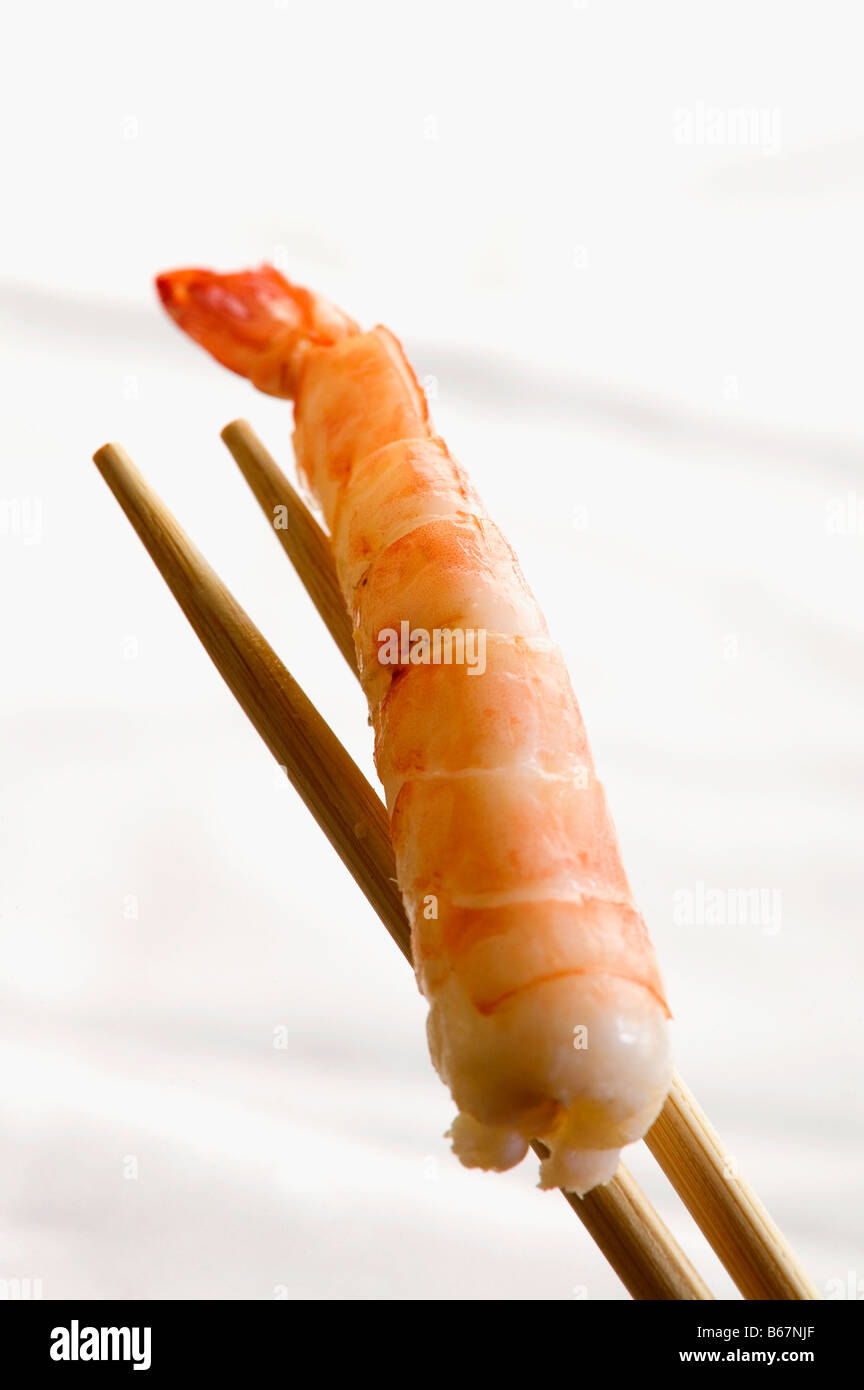 Close-up of prawn en baguettes Banque D'Images