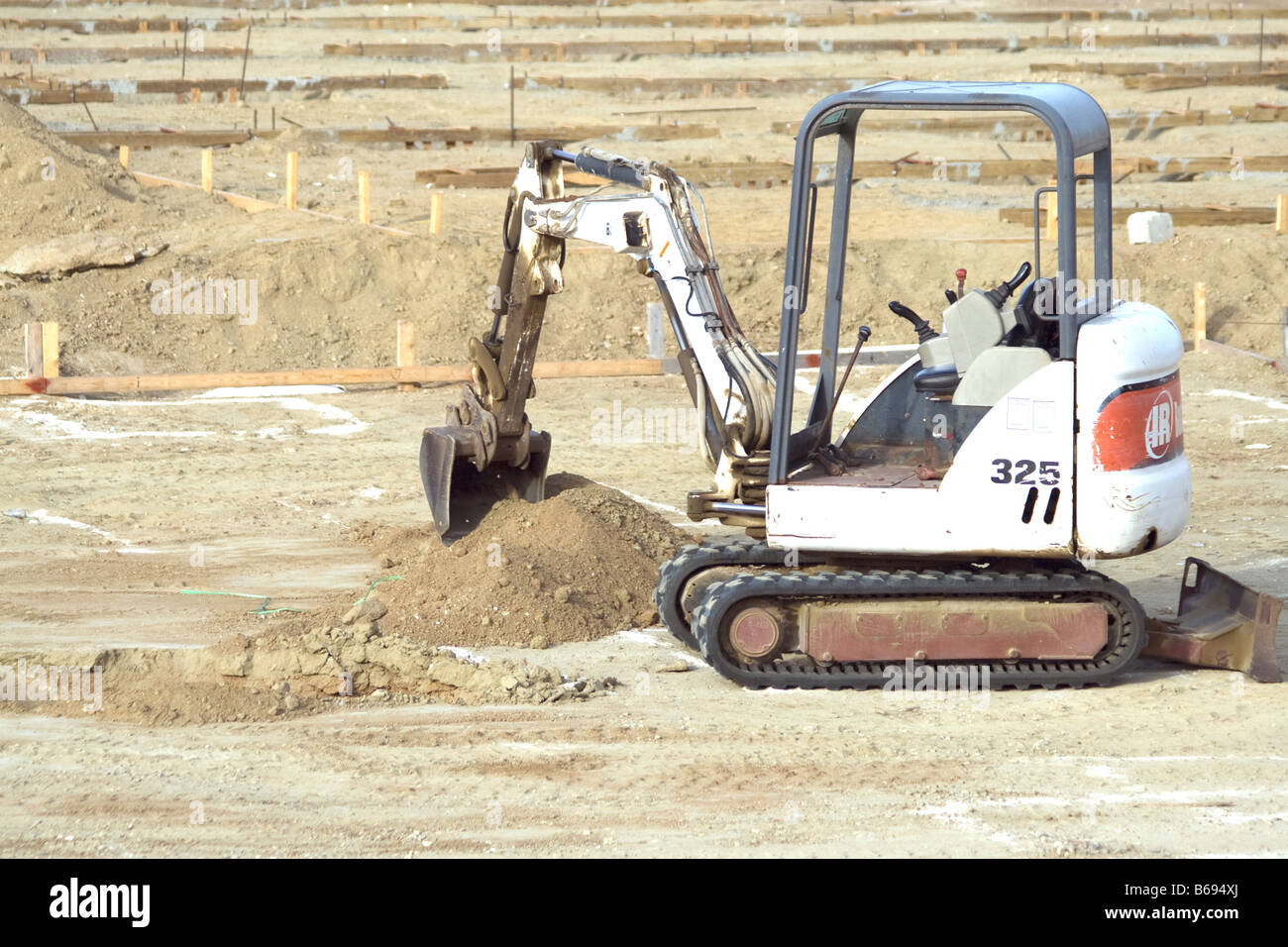 Mini-pelle Bobcat 325 at construction site à Aruba Banque D'Images