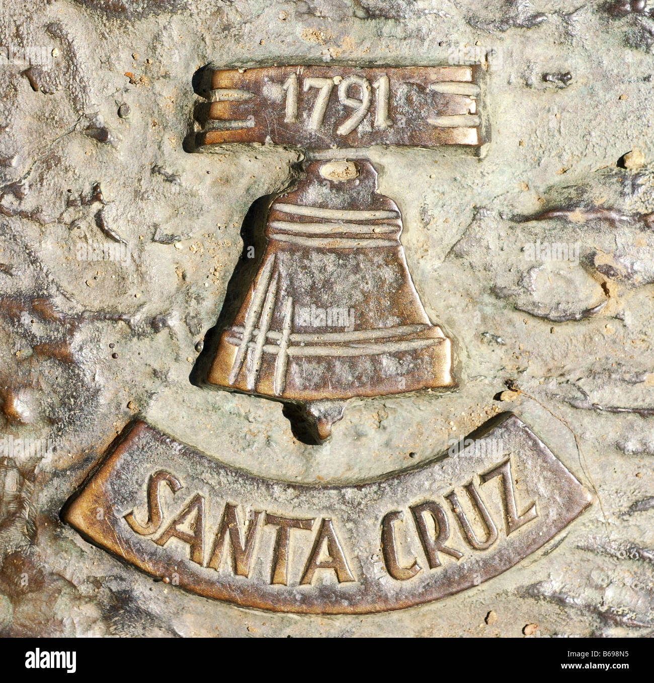 Mission Santa Cruz plaque sur statue à la California State University Sacramento Banque D'Images