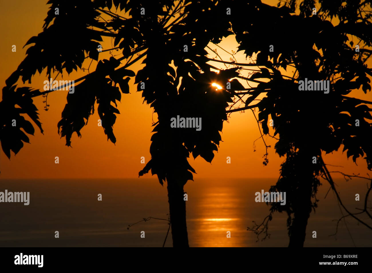 Coucher de réflexion sur l'eau, République de Costa Rica, en Amérique centrale, l'Océan Pacifique Banque D'Images