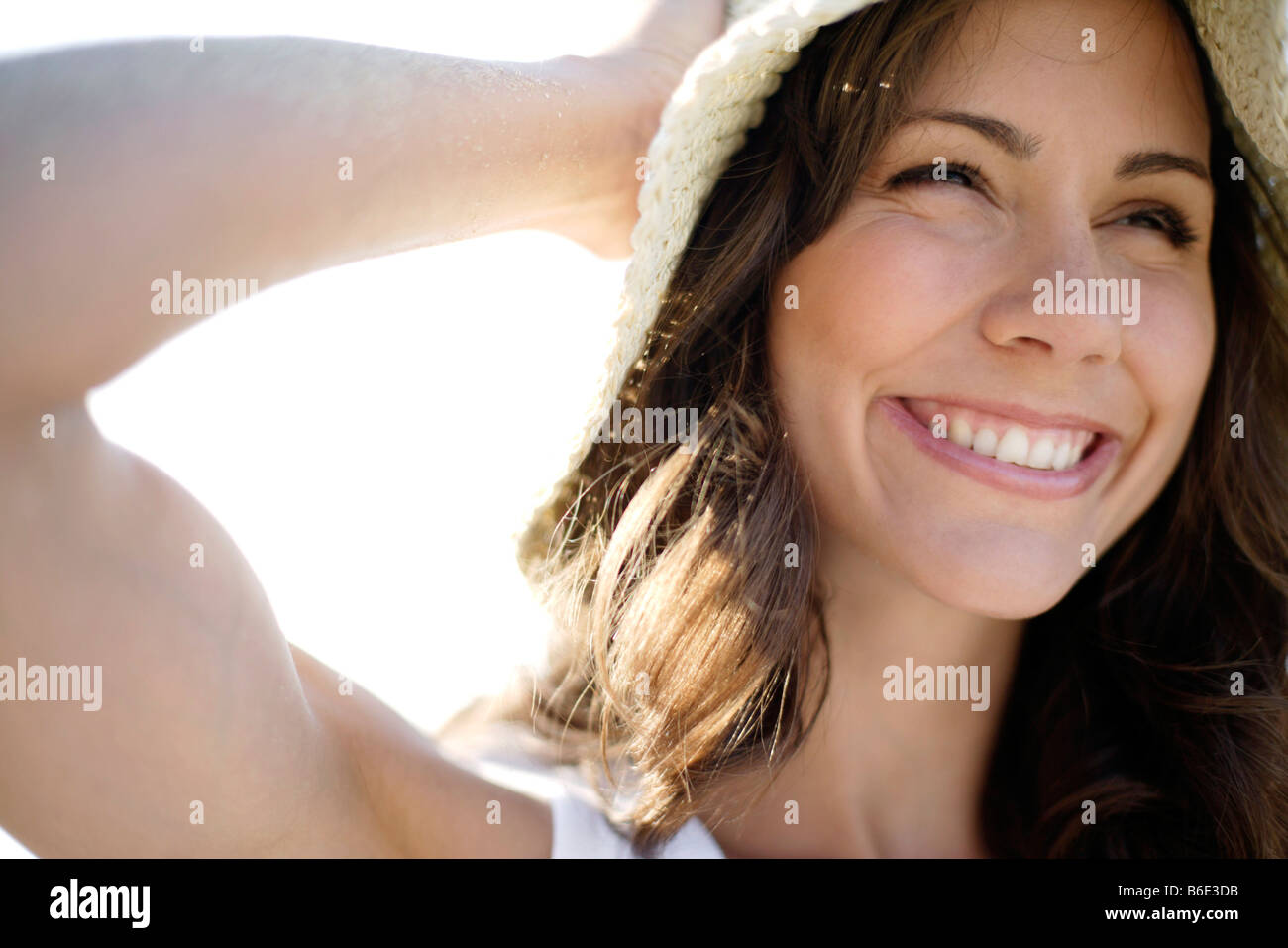 Woman wearing sunhat Banque D'Images