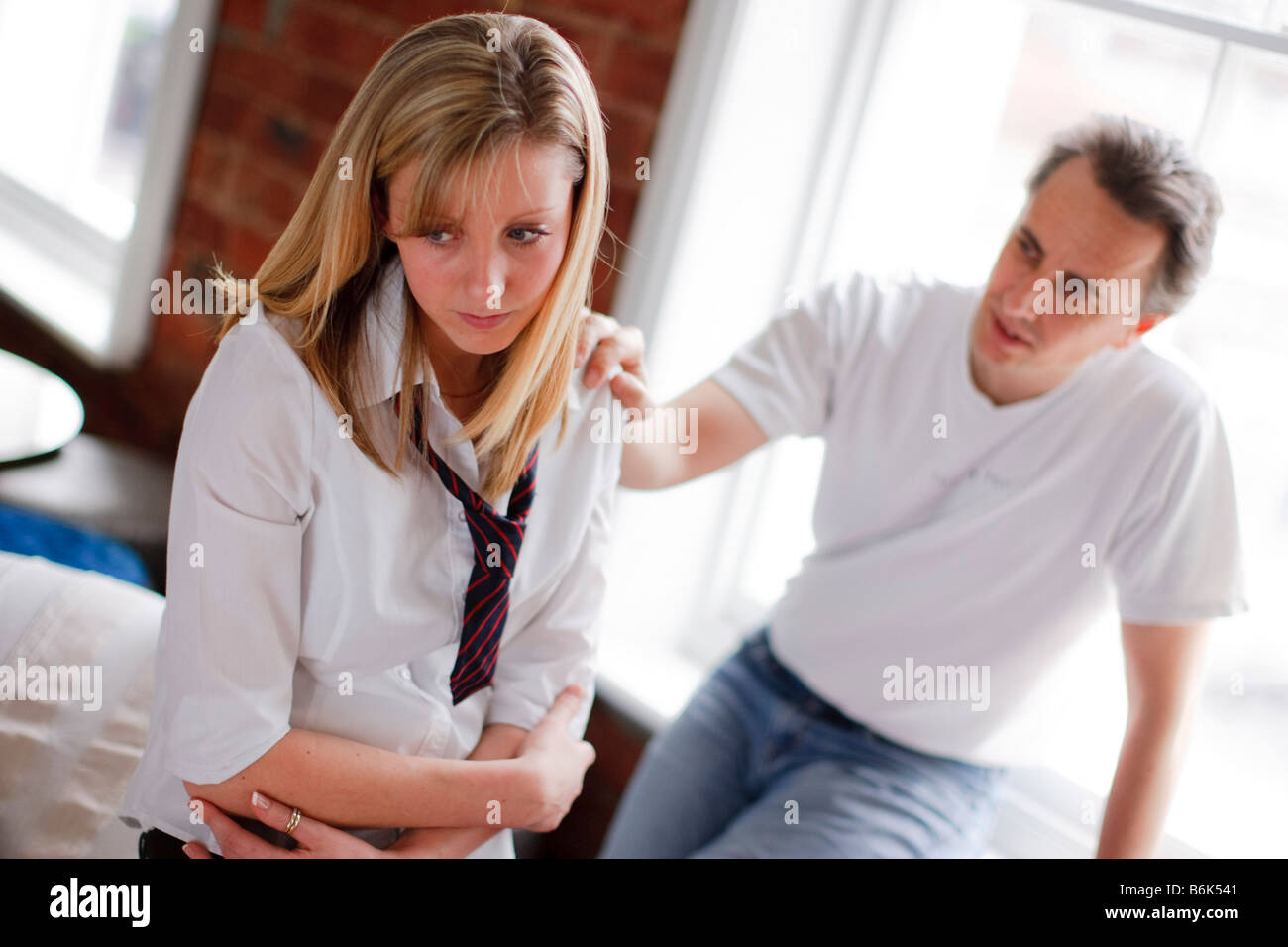 Père fille consolant Banque D'Images