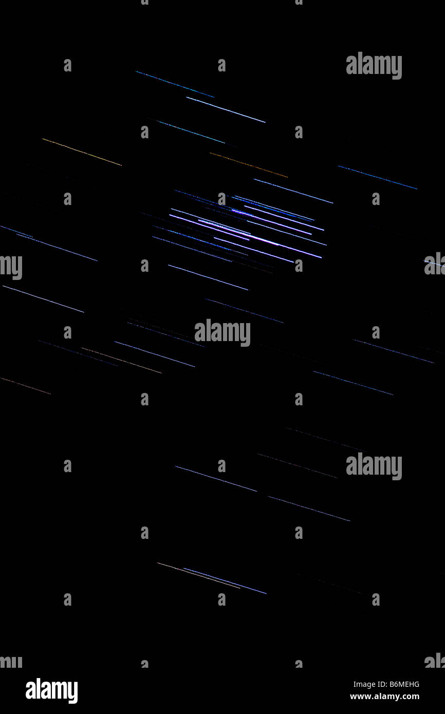 Star Trail de la constellation des Pléiades dans le ciel de nuit Banque D'Images