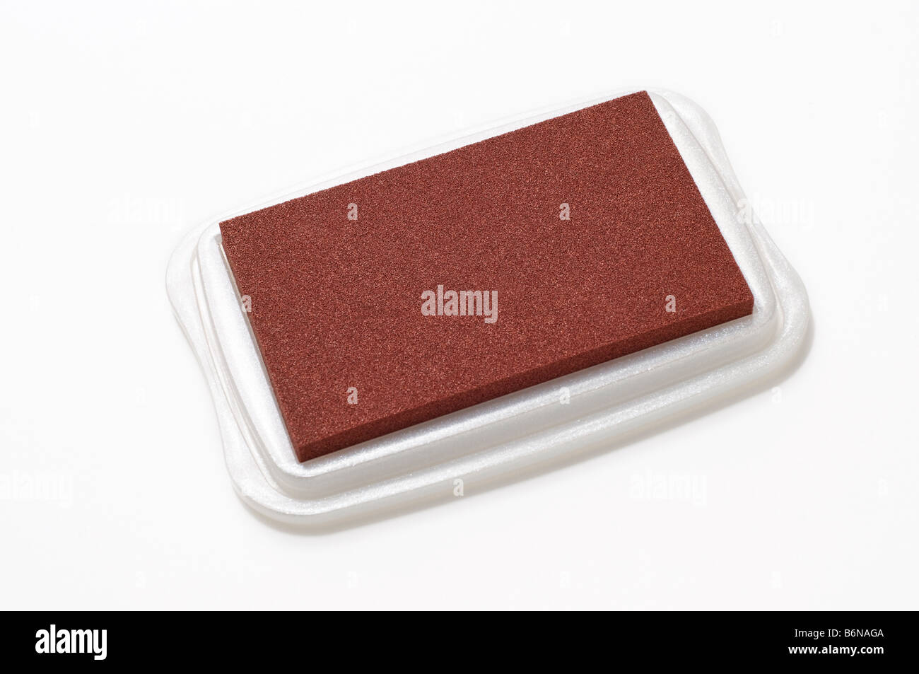 Timbres en caoutchouc rouge brique tampon encreur Banque D'Images