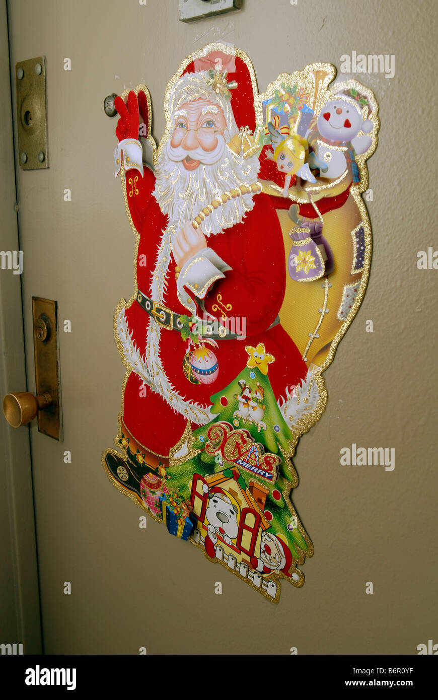 Père Noël décore une porte de l'appartement à New York, le vendredi 12 décembre 2008 Richard B Levine Banque D'Images