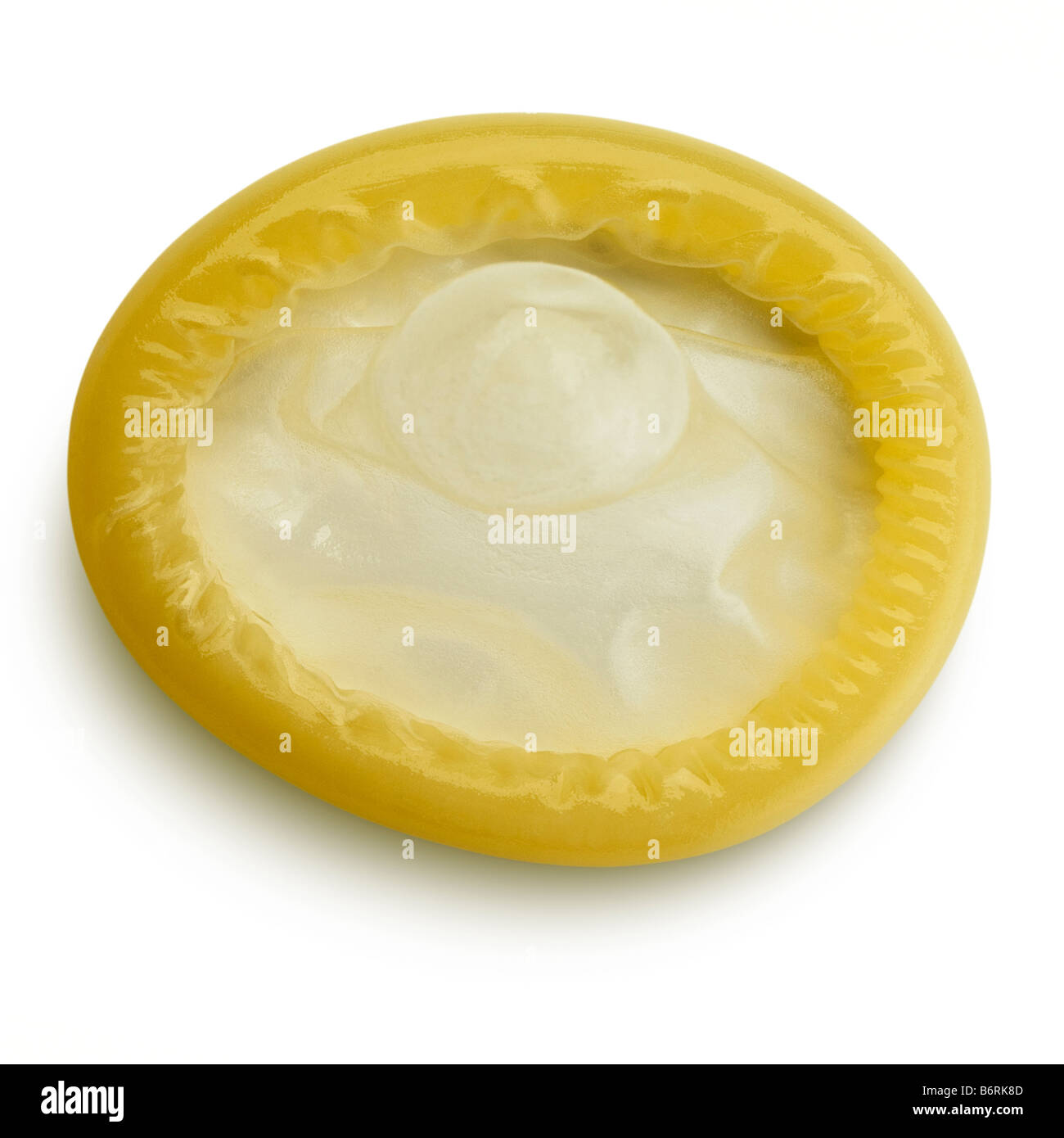 Un condom non utilisé sur blanc Banque D'Images