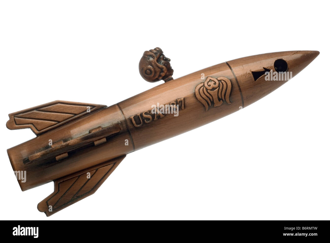 Un metal toy rocket flying up with clipping path Banque D'Images