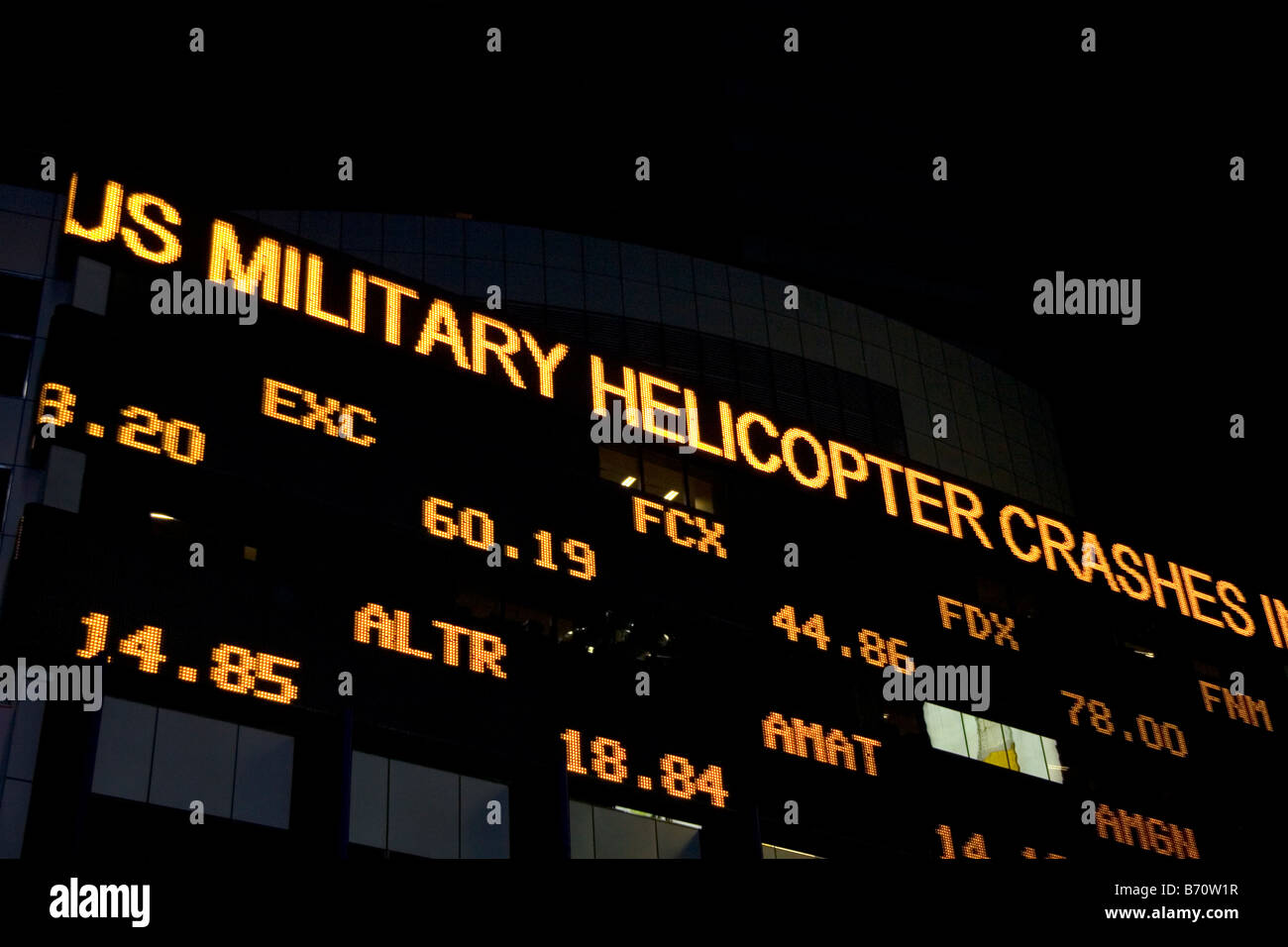 News et stock ticker dans Times Square Manhattan New York City New York USA Banque D'Images