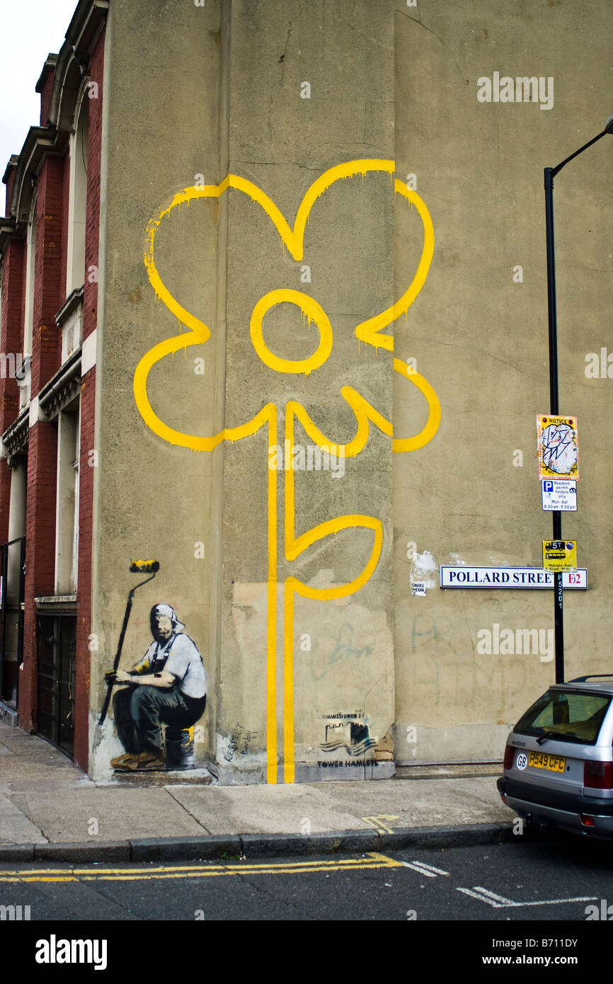 Graffiti Banksy - fleur jaune3 Banque D'Images