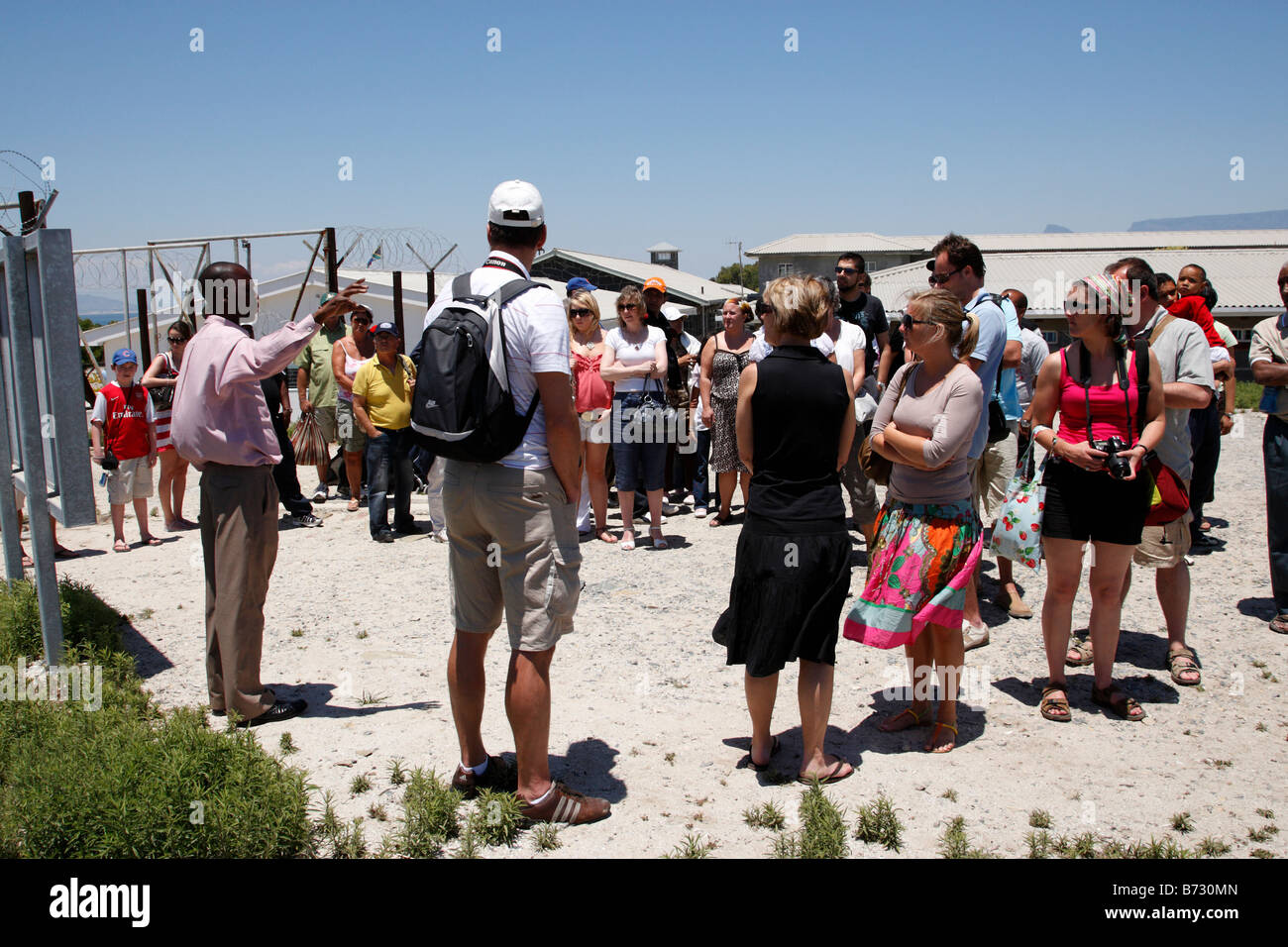 Visite touristique à l'écoute du groupe ex prisonnier politique Robben Island guide Cape town afrique du sud Banque D'Images