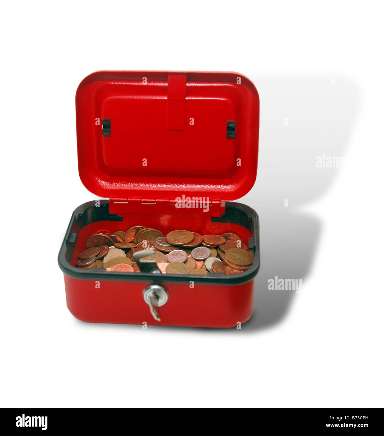 L'argent sterling avec une boîte de pièces de monnaie. Banque D'Images
