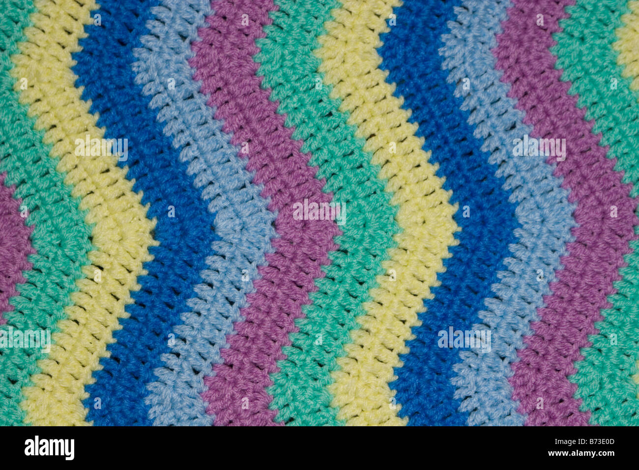 Zigzags crochet couverture multi couleur closeup Banque D'Images