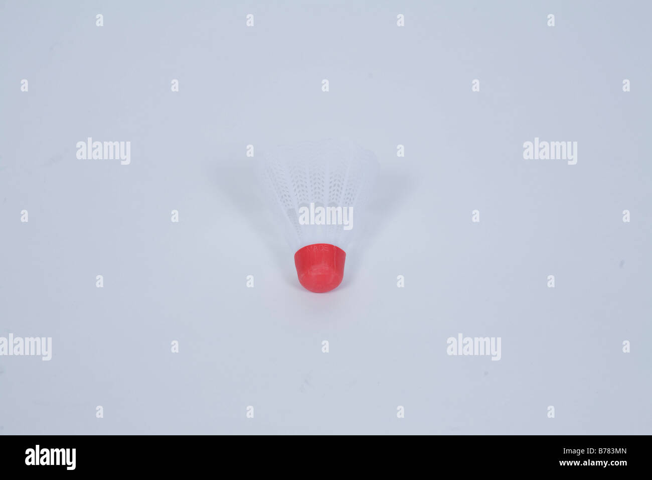 Badminton against white background Banque D'Images