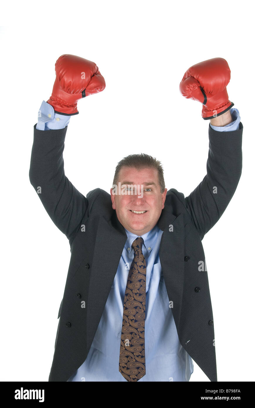 Un homme leva les bras en signe de victoire lors de la négociation du contrat Banque D'Images