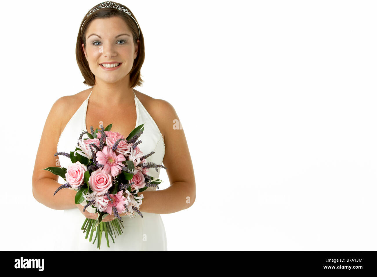 Portrait Of Bride Holding Bouquet de fleurs Banque D'Images