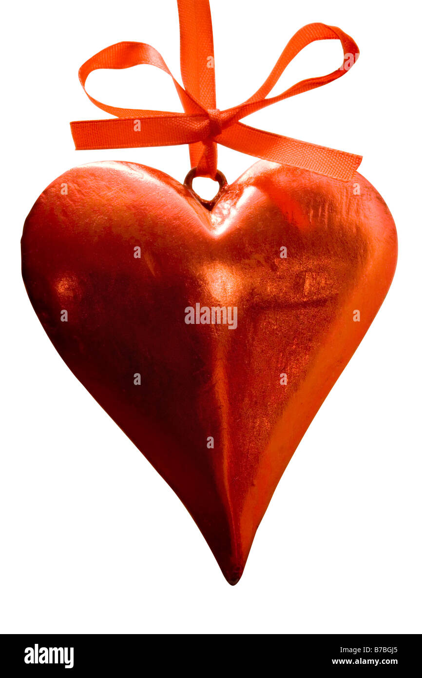 Amour rouge coeur suspendu par un ruban rouge Banque D'Images