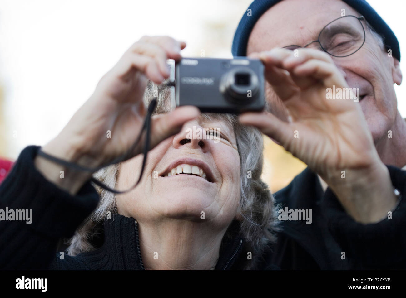 Un couple prend des photos de l'inauguration d'Obama à l'Université de Californie à Berkeley. Banque D'Images