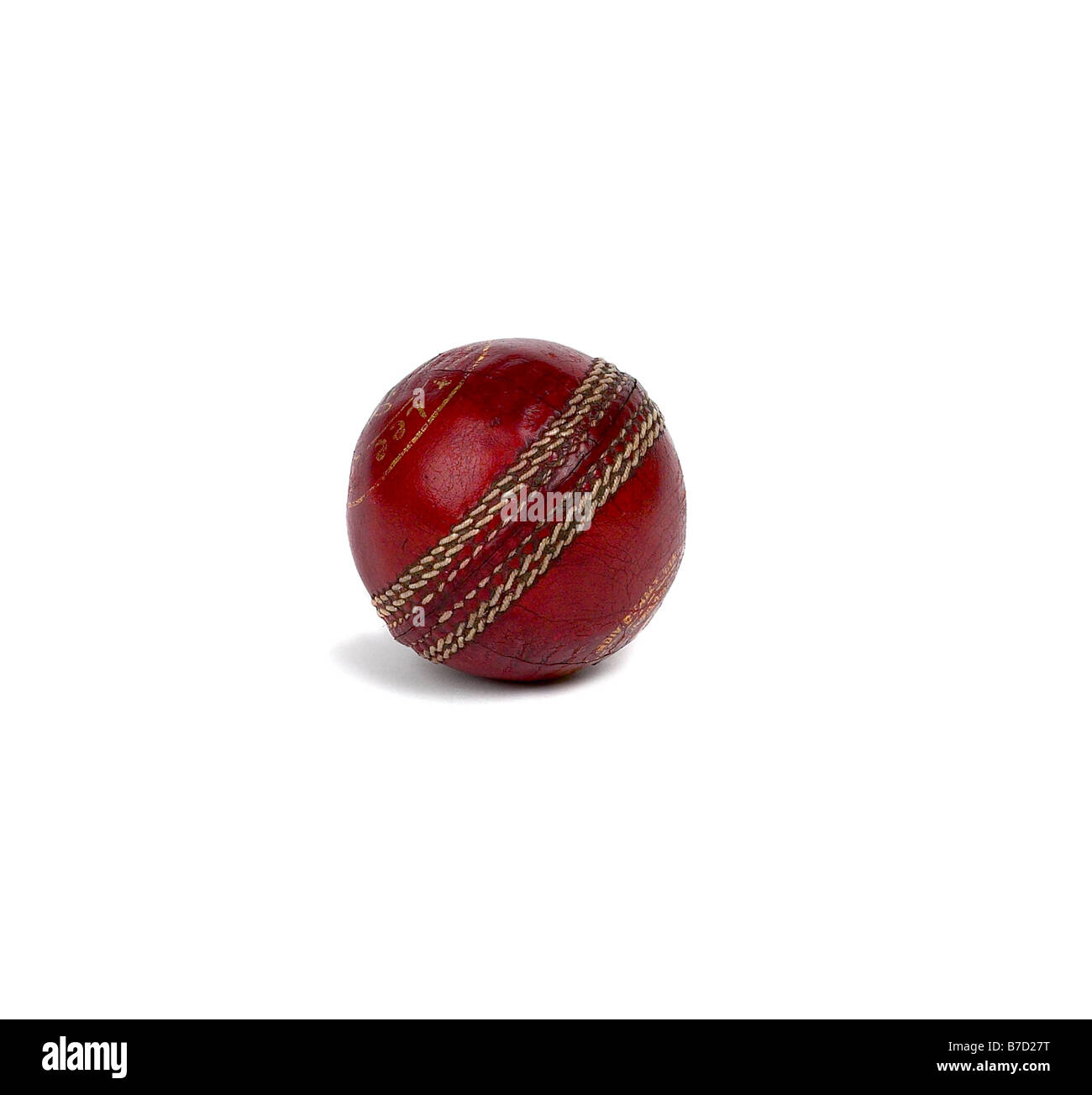 Le cricket BALL COUTURE ROUGE USÉ VIEUX SPIN EN DÉTRESSE Banque D'Images