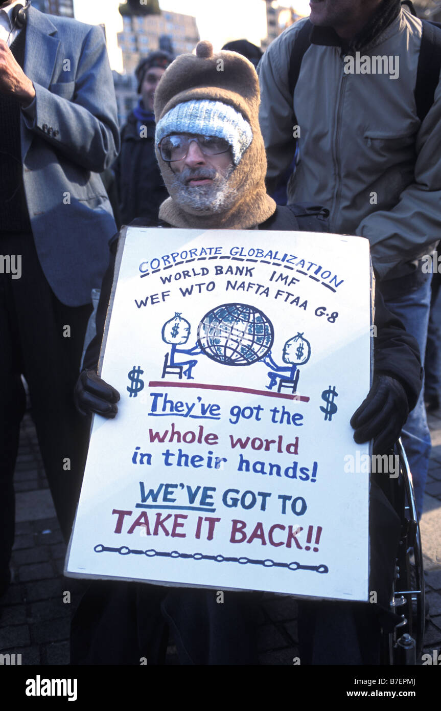 Manifestant à réunion de l'OMC à New York City Banque D'Images