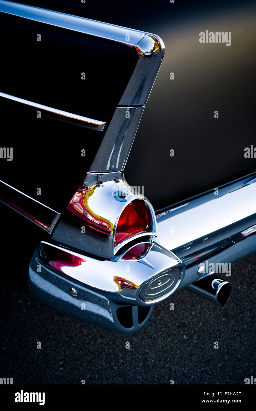 Détail de l'extrémité arrière et le pare-chocs, y compris l'emblématique, dérive d'un Chevy 1957. Banque D'Images