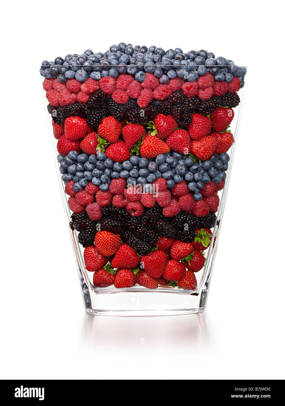 Vase en verre de fruits rouges mélangés Banque D'Images