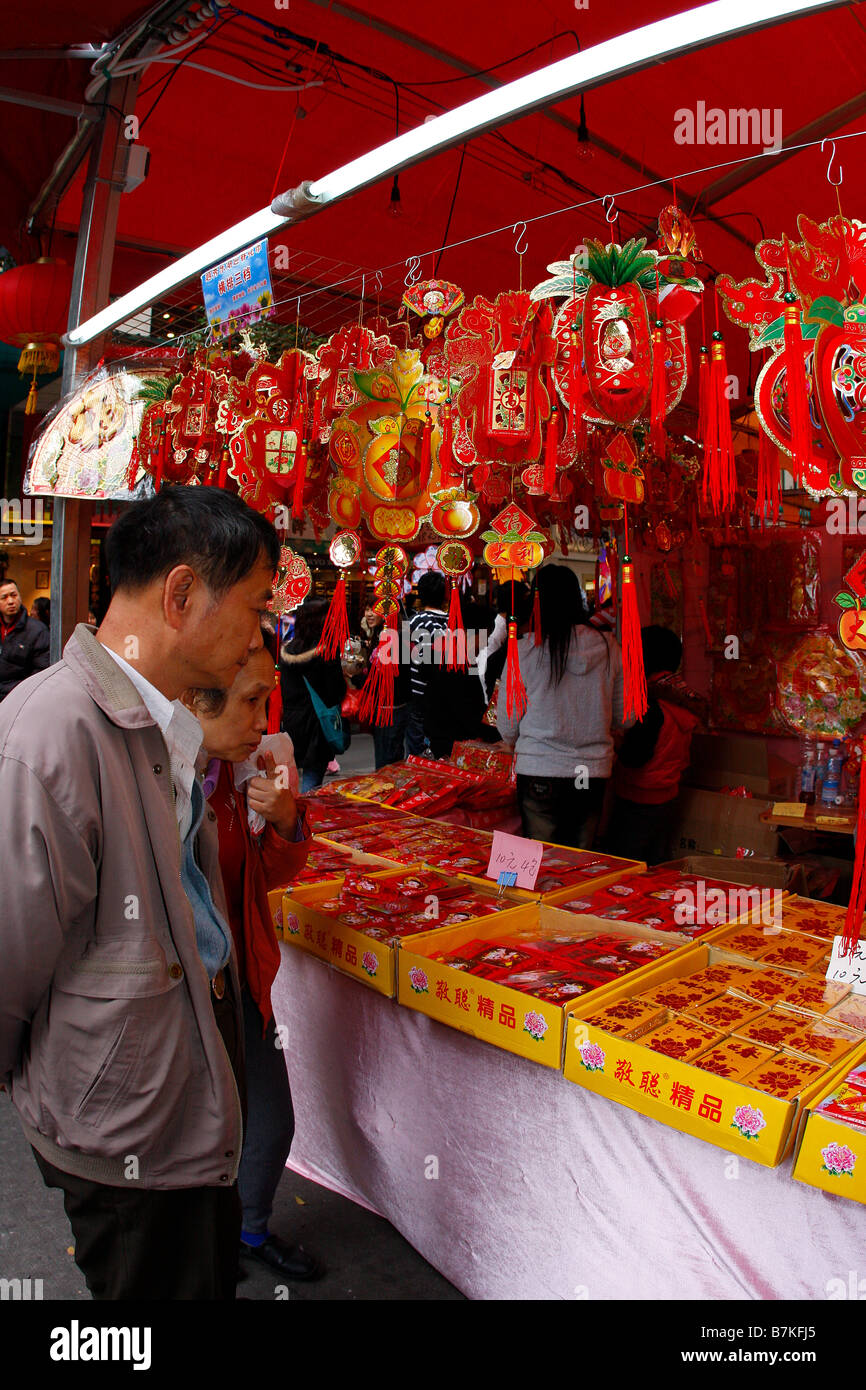 Chantres du Nouvel An chinois à la recherche des enveloppes rouges Banque D'Images