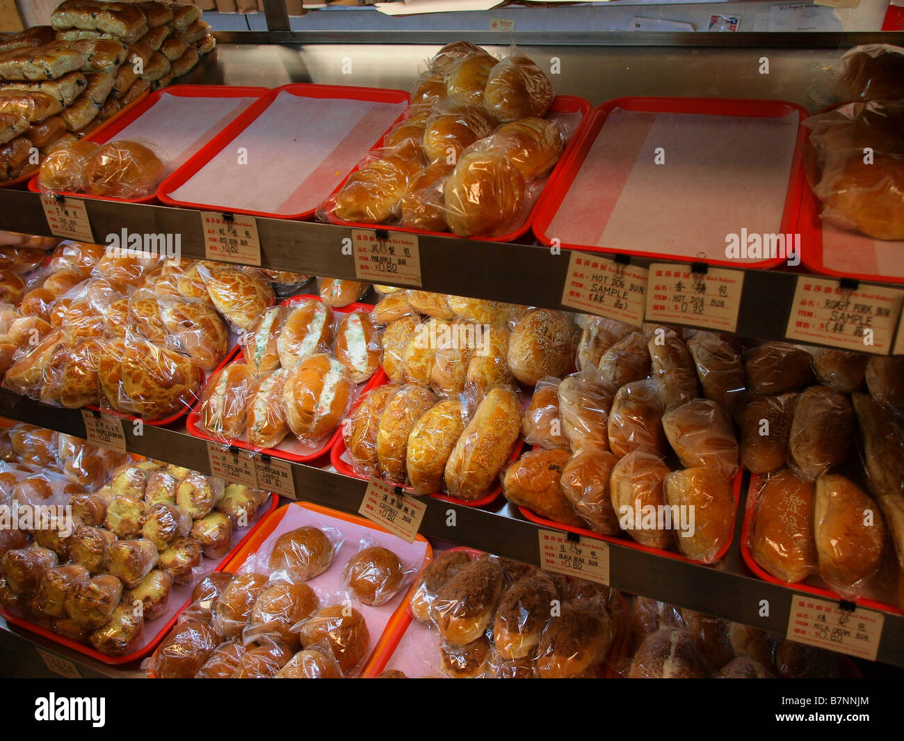 Des petits pains et pâtisseries à une boulangerie chinois dans Chinatown, New York. Banque D'Images