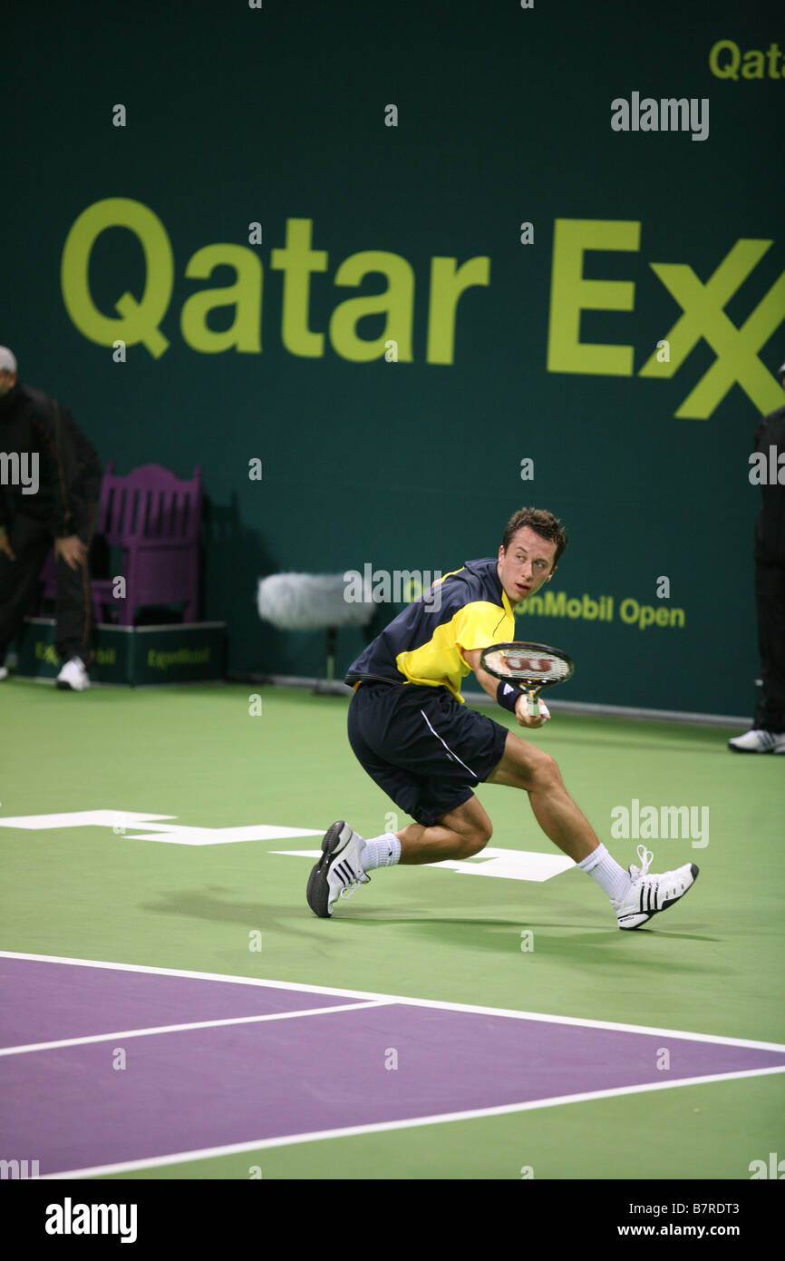 Star allemande de commentaires jouer à World No 2 Roger Federer à l'Open du Qatar 2009 à Doha Banque D'Images