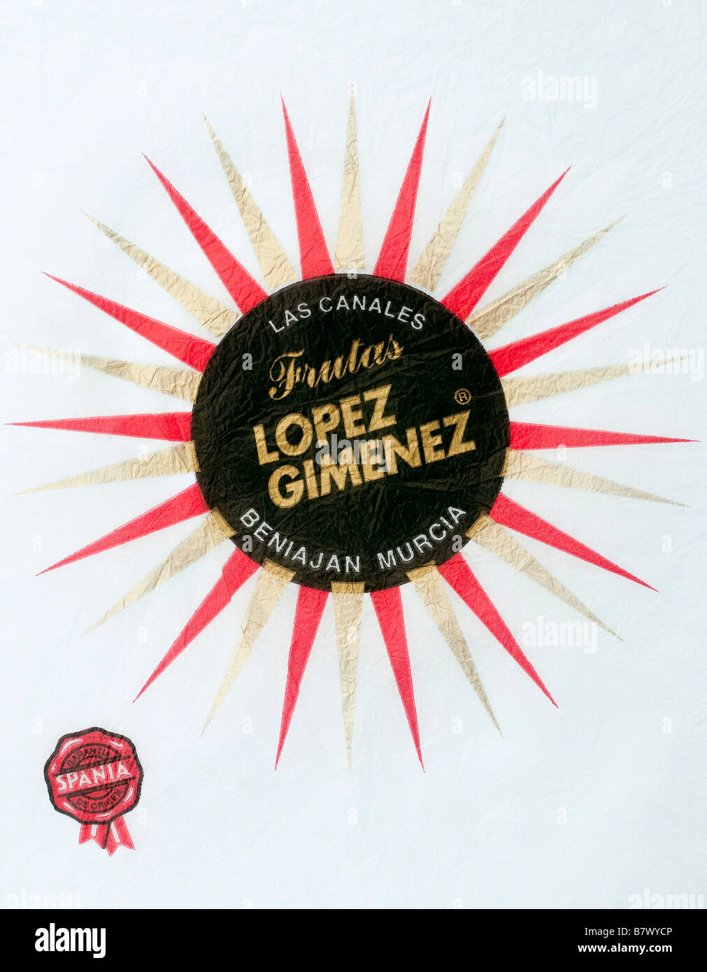 Agrumes wrapper à partir de l'Espagne - Disque Noir sur rouge / Gold Star illustration sur papier de soie. Banque D'Images