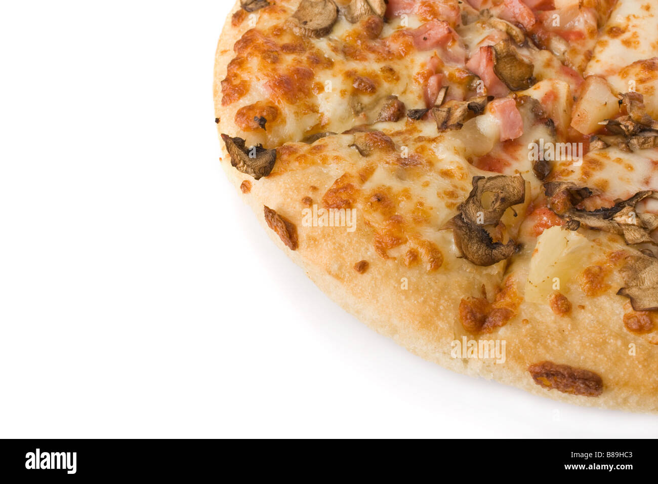 Pizza aux champignons, jambon et ananas détail Banque D'Images