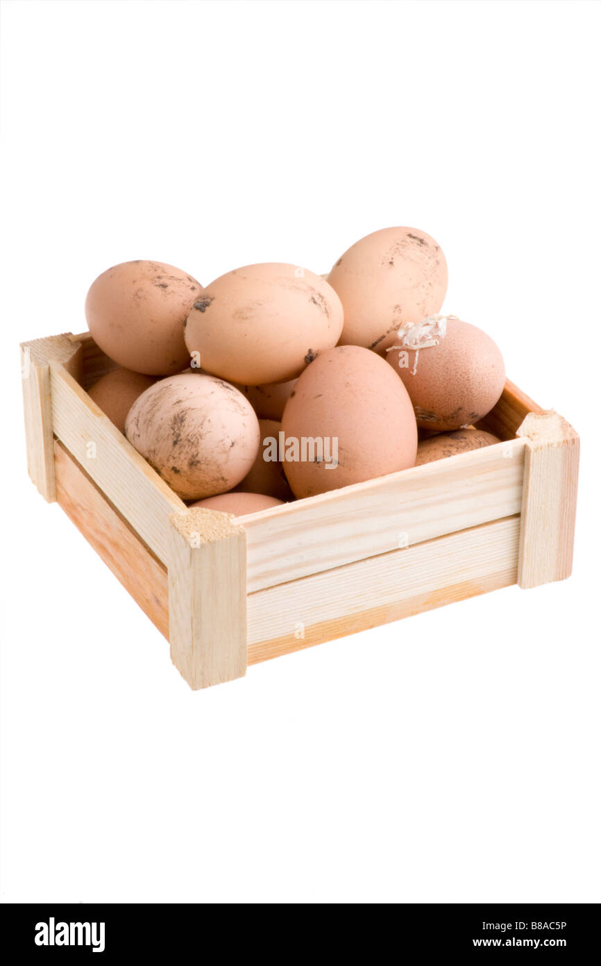 Des œufs biologiques dans une boîte en bois Banque D'Images
