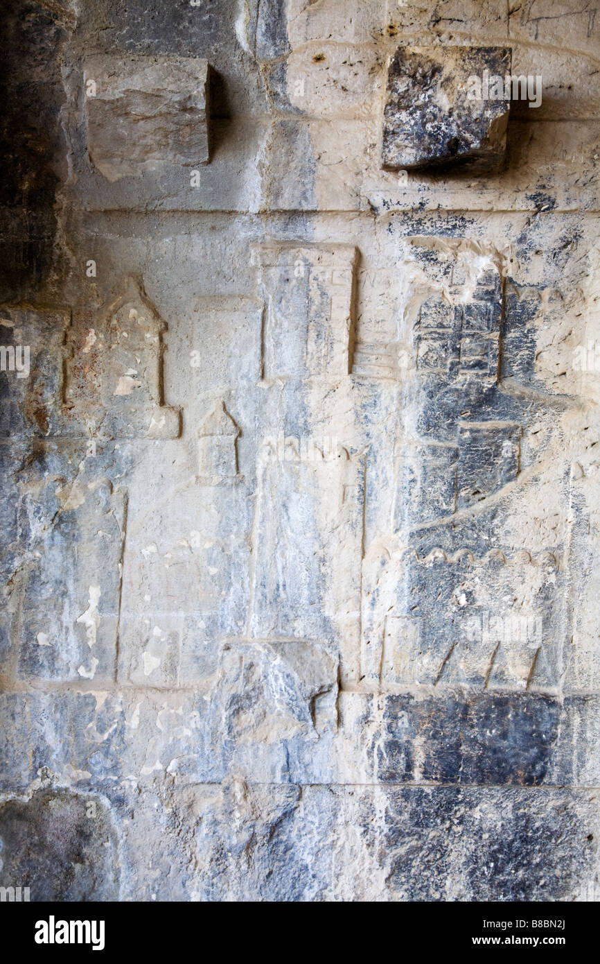 Une sculpture antique dans un tombeau à Pinara rock en Turquie Banque D'Images