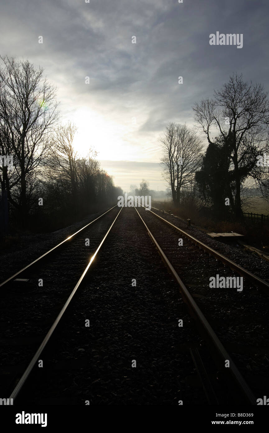 La convergence des lignes de chemin de fer, à l'aube lumière, Womersley, dans le Nord de l'Angleterre Banque D'Images