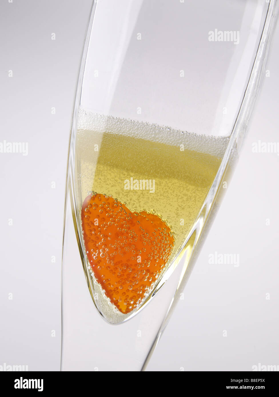 Coeur en verre de bulles de champagne Banque D'Images