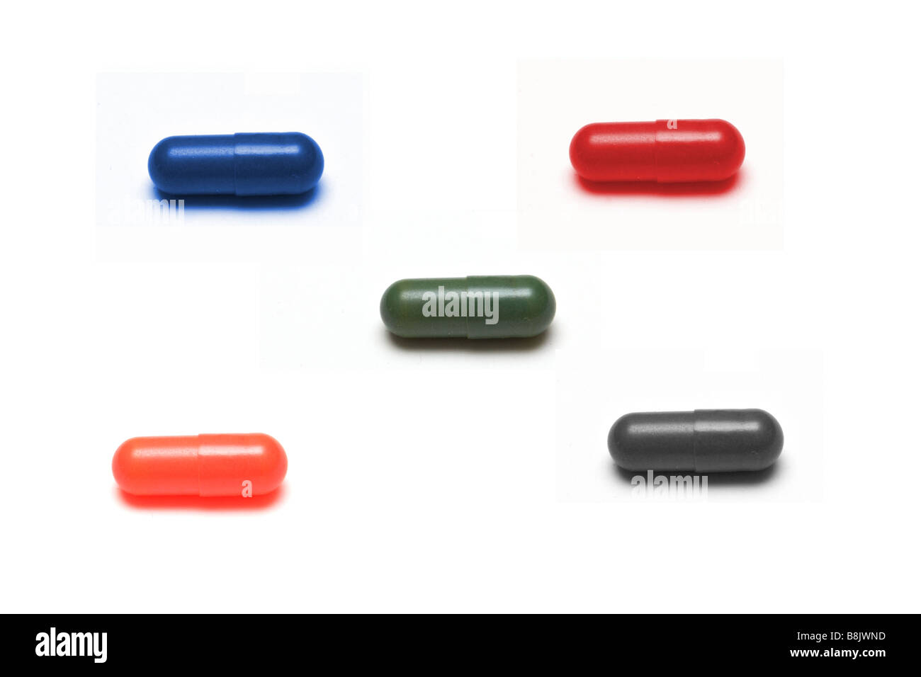 5 capsules colorées isolé sur fond blanc. Banque D'Images