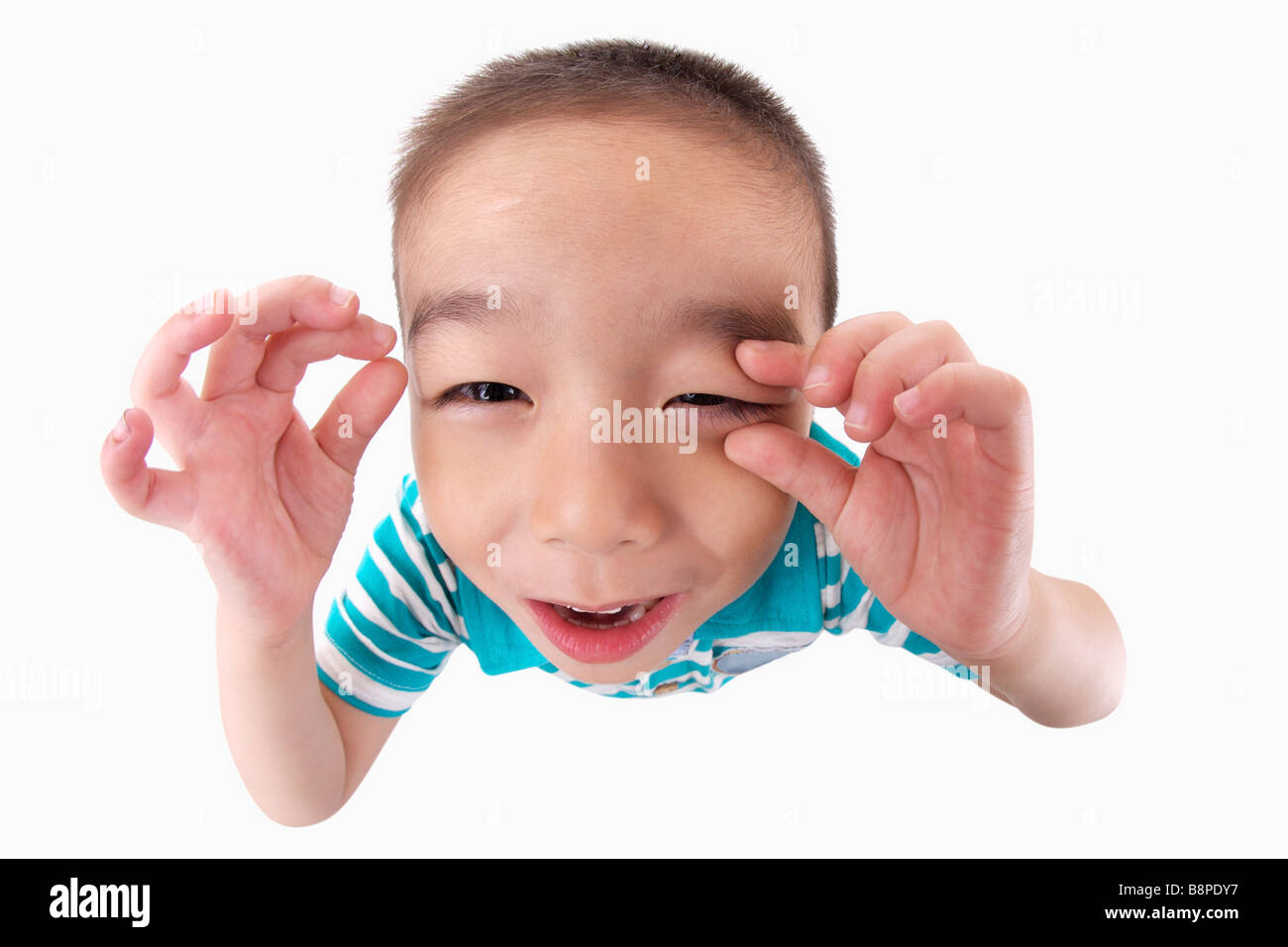 Boy making funny face portrait close up Banque D'Images