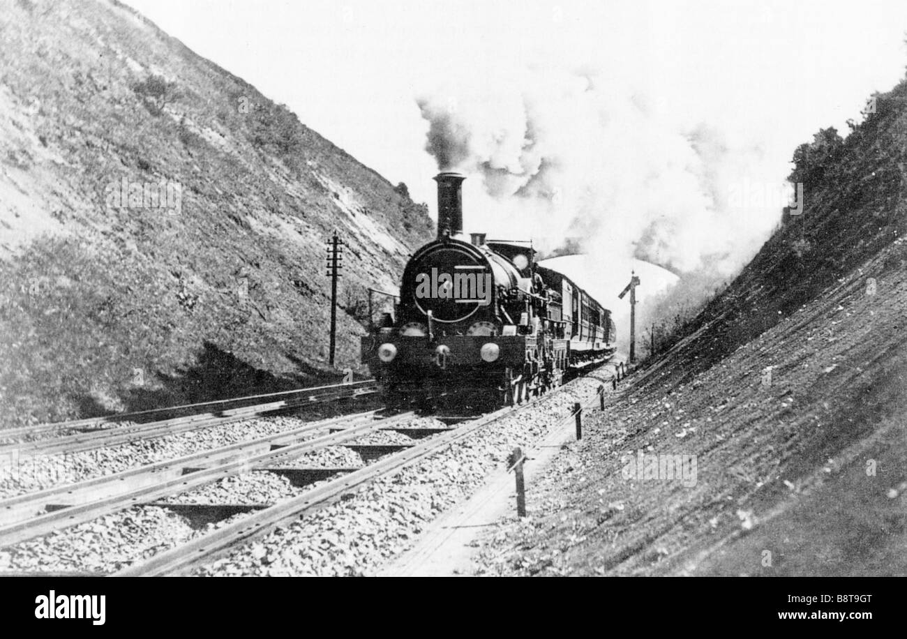 GWR Iron Duke 1890 Photo de la locomotive 522 tirer un train sur une voie mixte Banque D'Images