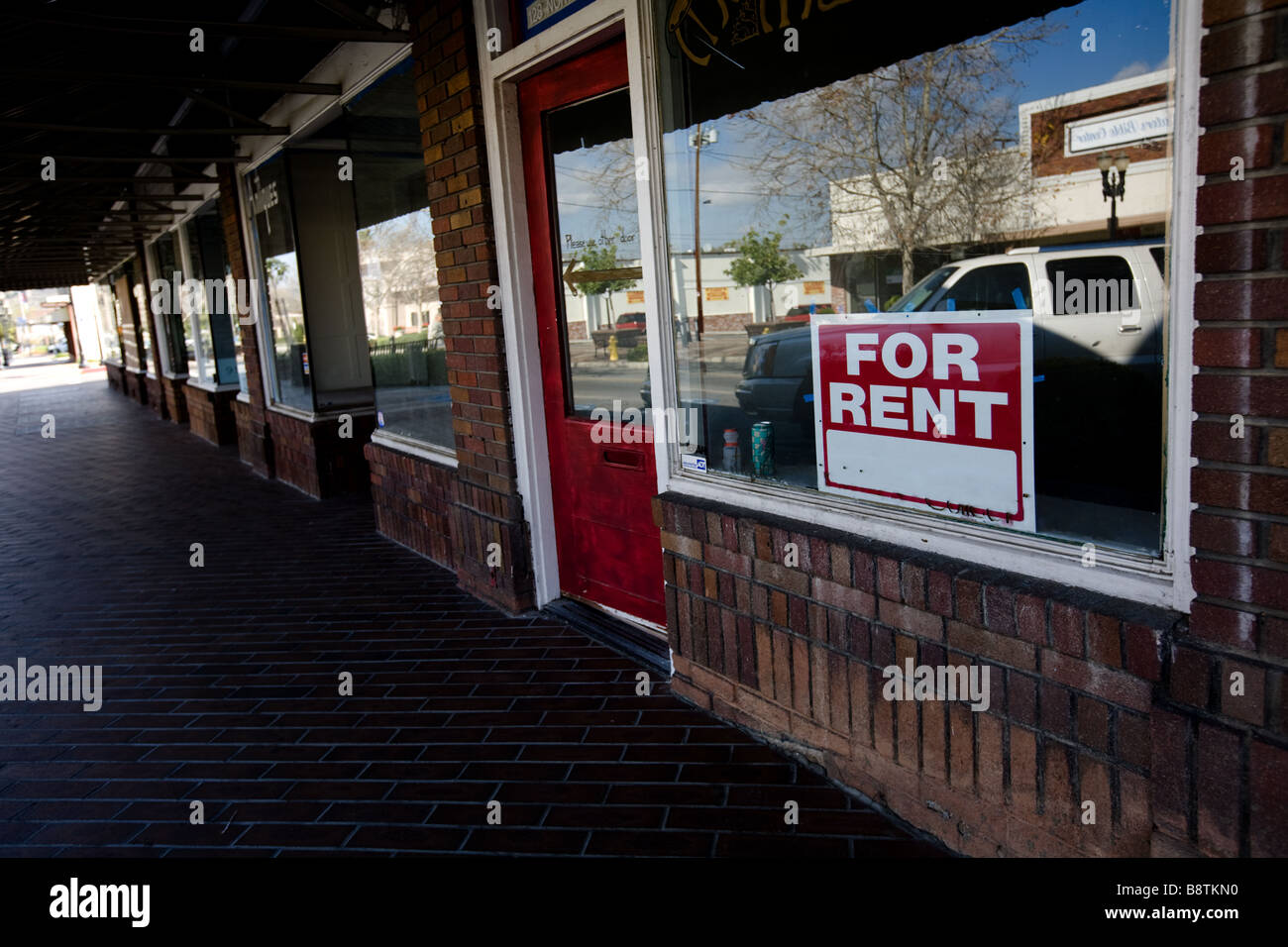 Un espace vide à louer dans un centre commercial Banque D'Images