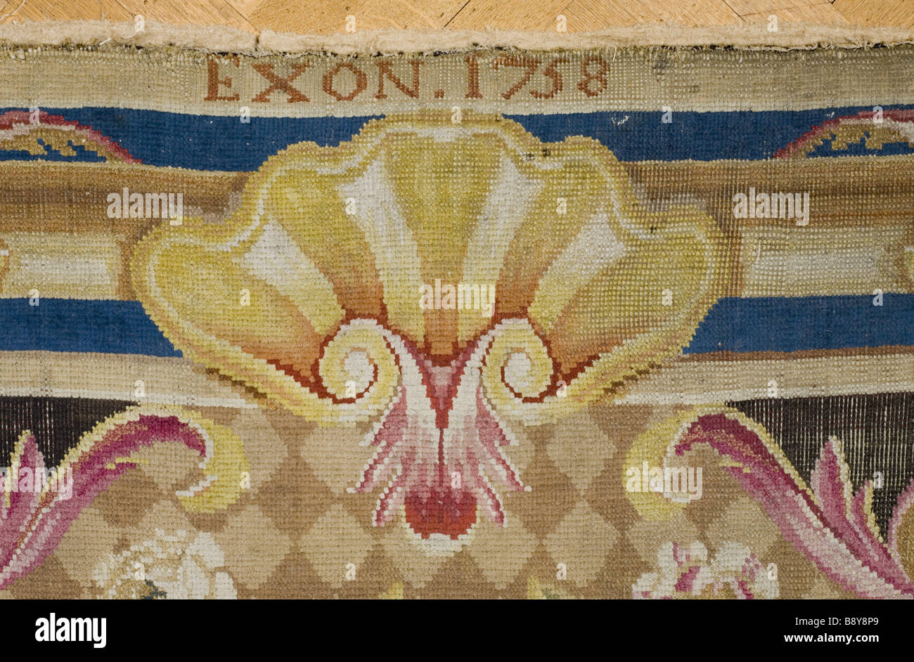 Détail de l'Exeter du tapis l'EXON 1758 sur le grand escalier à Petworth House West Sussex Banque D'Images