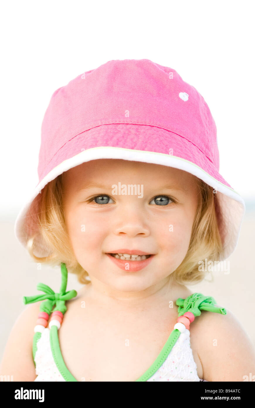 Girl in pink hat Banque D'Images