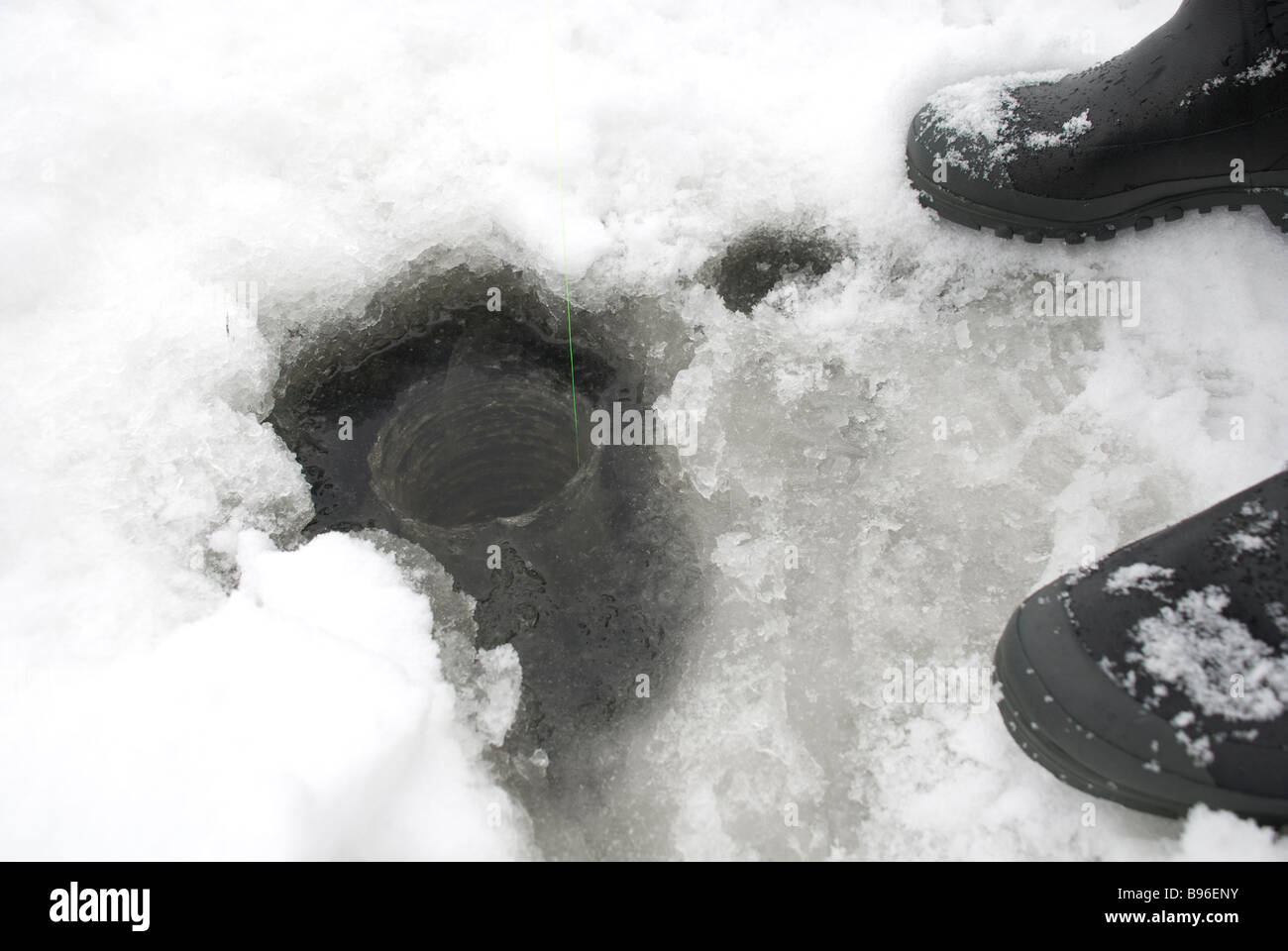 Trou de pêche sur glace. Banque D'Images