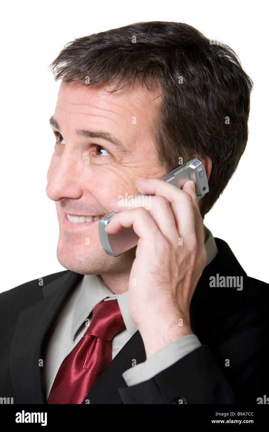 Businessman talking on cell phone Banque D'Images