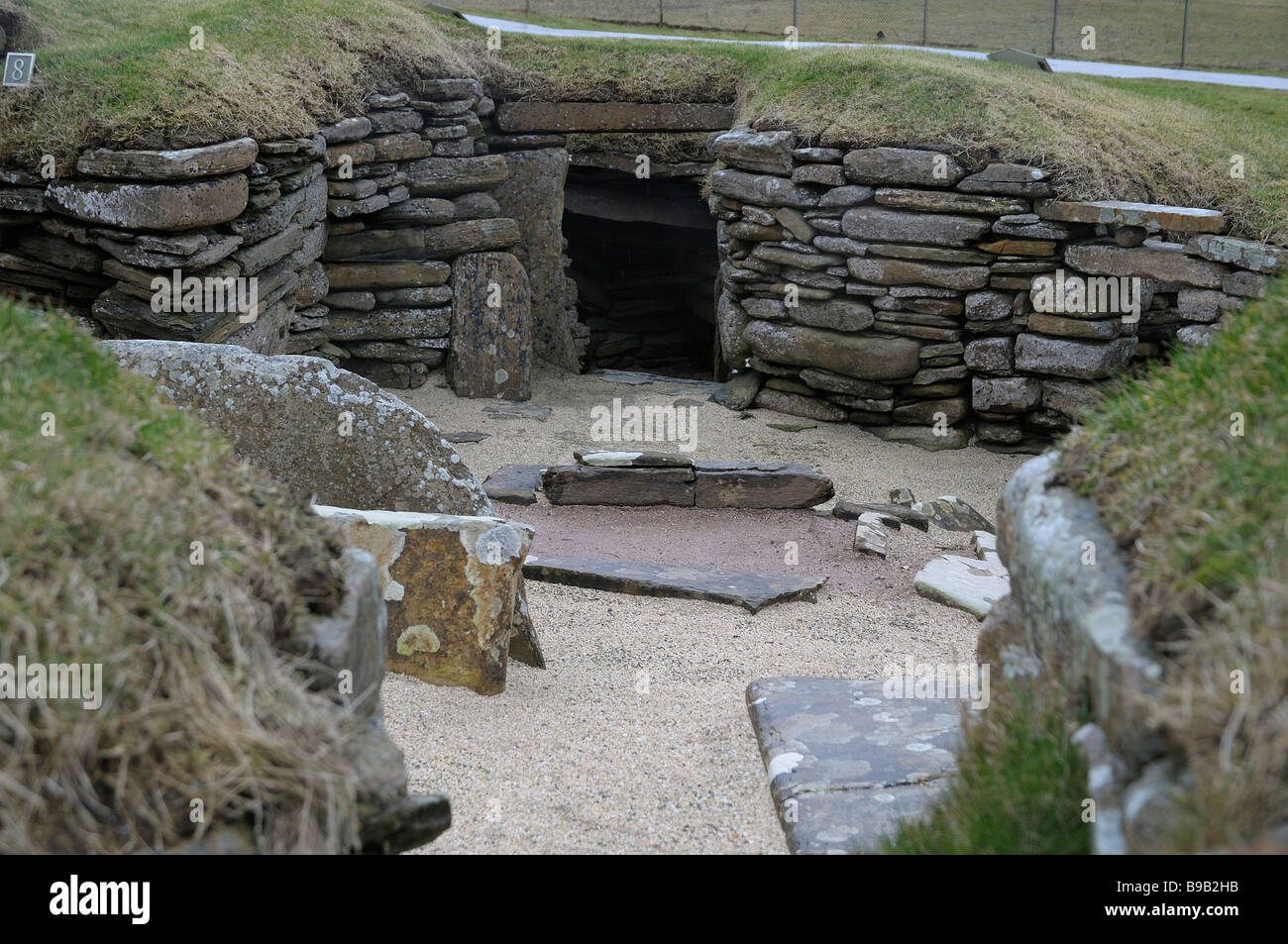 Une des anciennes rotondes excavées au Skara Brae, Orcades, en Écosse. Banque D'Images