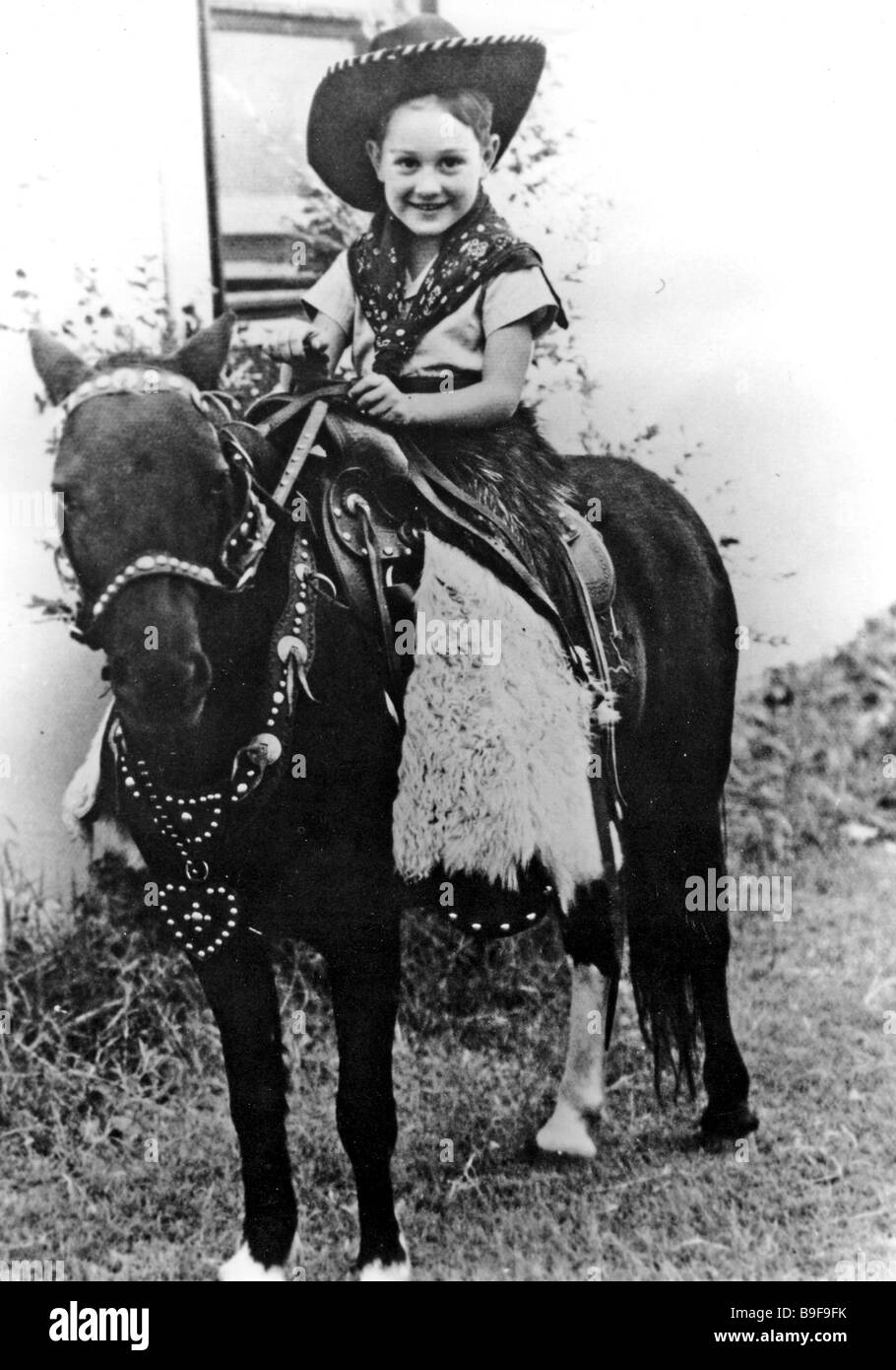 BUDDY Holly (1936-1959) âgé d'environ six cowboys à jouer dans sa ville natale de Lubbock au Texas Banque D'Images