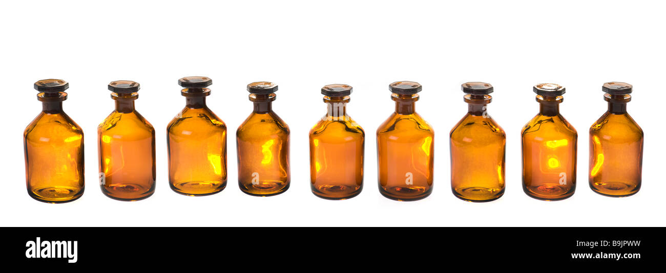 Bouteille d'apothicaire médicament pharmacie bouteille en verre bouteille pharmaceutique symbole orange brun traditionnel de stockage magasin symbolique Banque D'Images