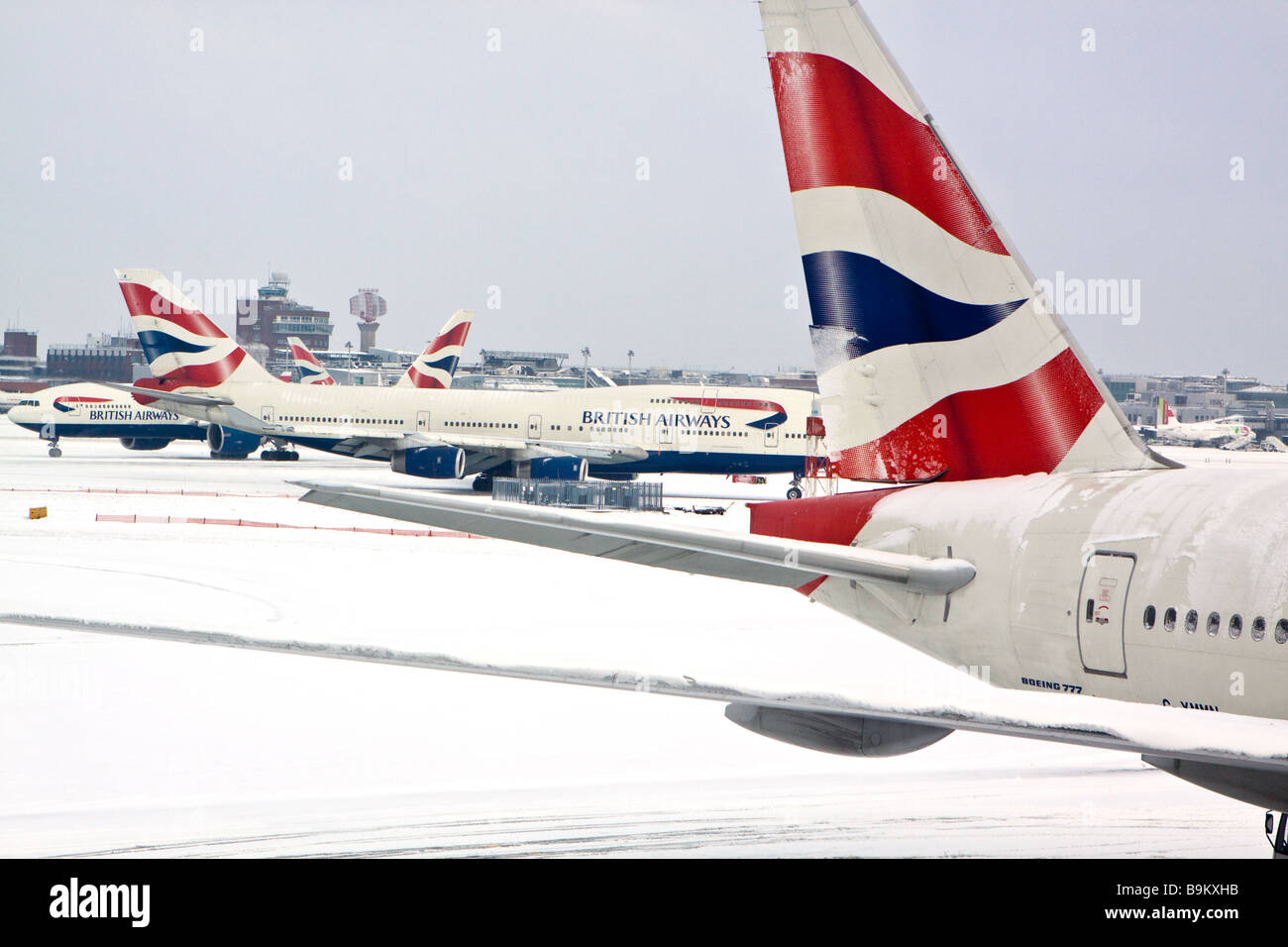 Perturbations de la circulation de l'air provoquant la neige à Heathrow Banque D'Images