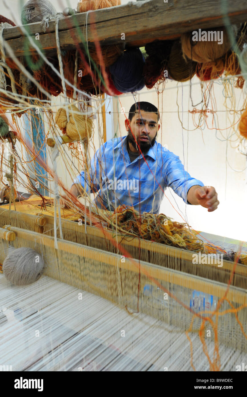 L'Egypte près de saqqara ou saqqarah Les travailleurs d'une usine de fabrication des tapis Banque D'Images
