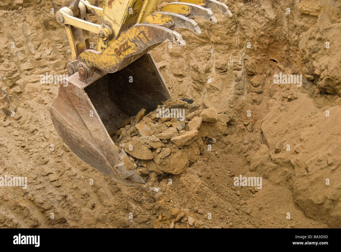 Godet d'excavation de grès dépose Banque D'Images