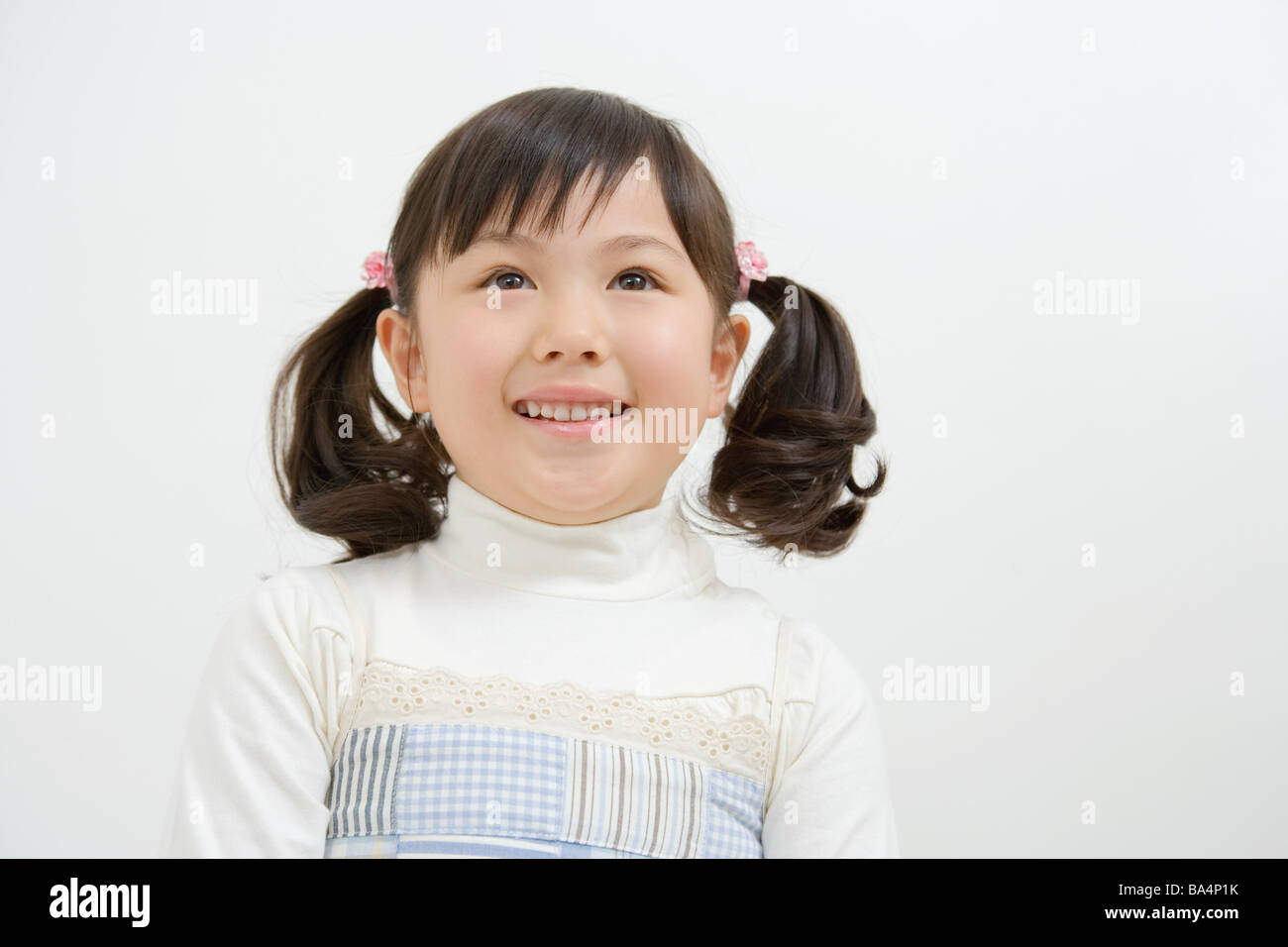 Asian girl smiling, portrait Banque D'Images