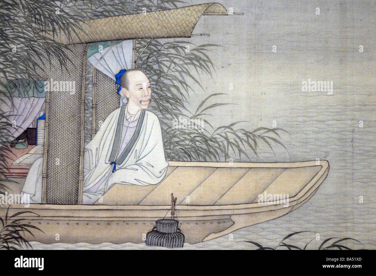 Peinture chinoise ancienne de l'homme sage dans un bateau. Banque D'Images